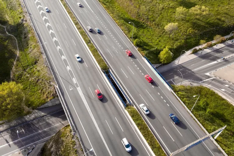 Aerial view of a road and its vehicles